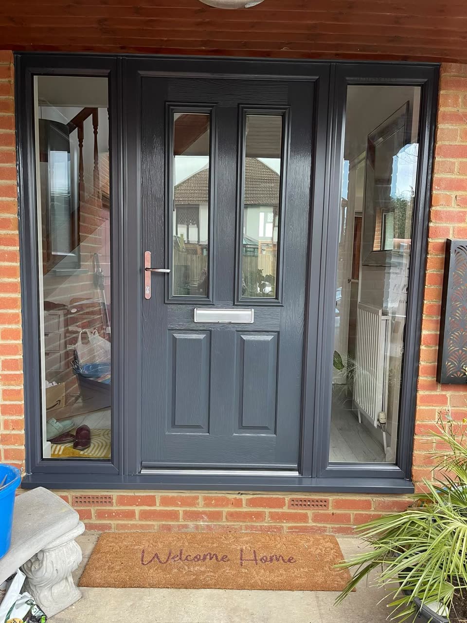Anthracite grey front door with glazed side panels
