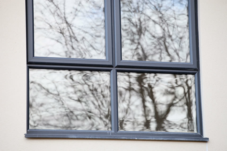 Anthracite grey window frames with Georgian bars